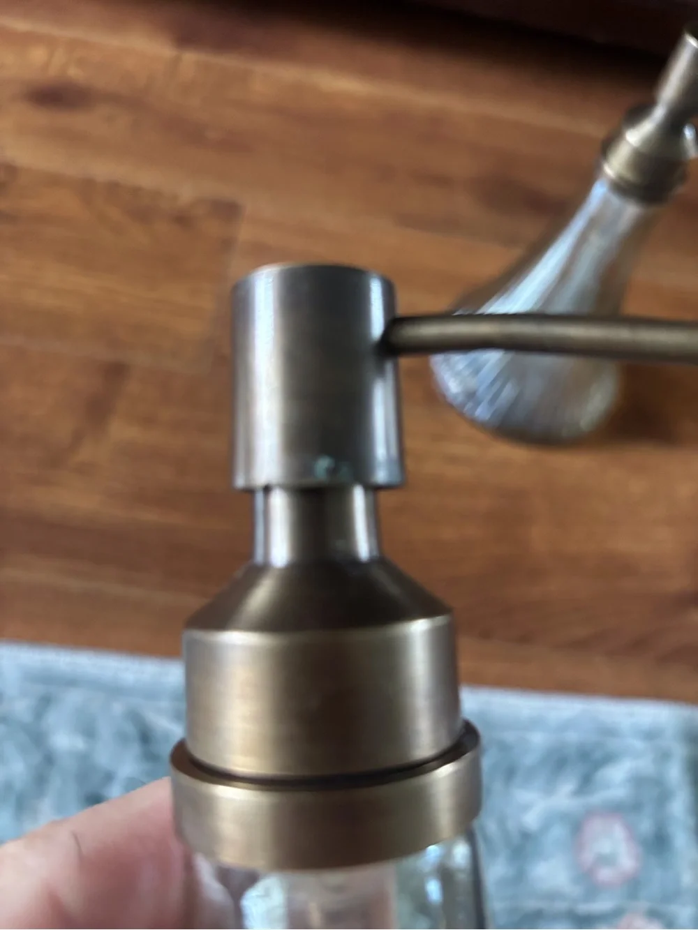 Pair of Ribbed Glass Soap Dispensers with Brass-Tone Pumps